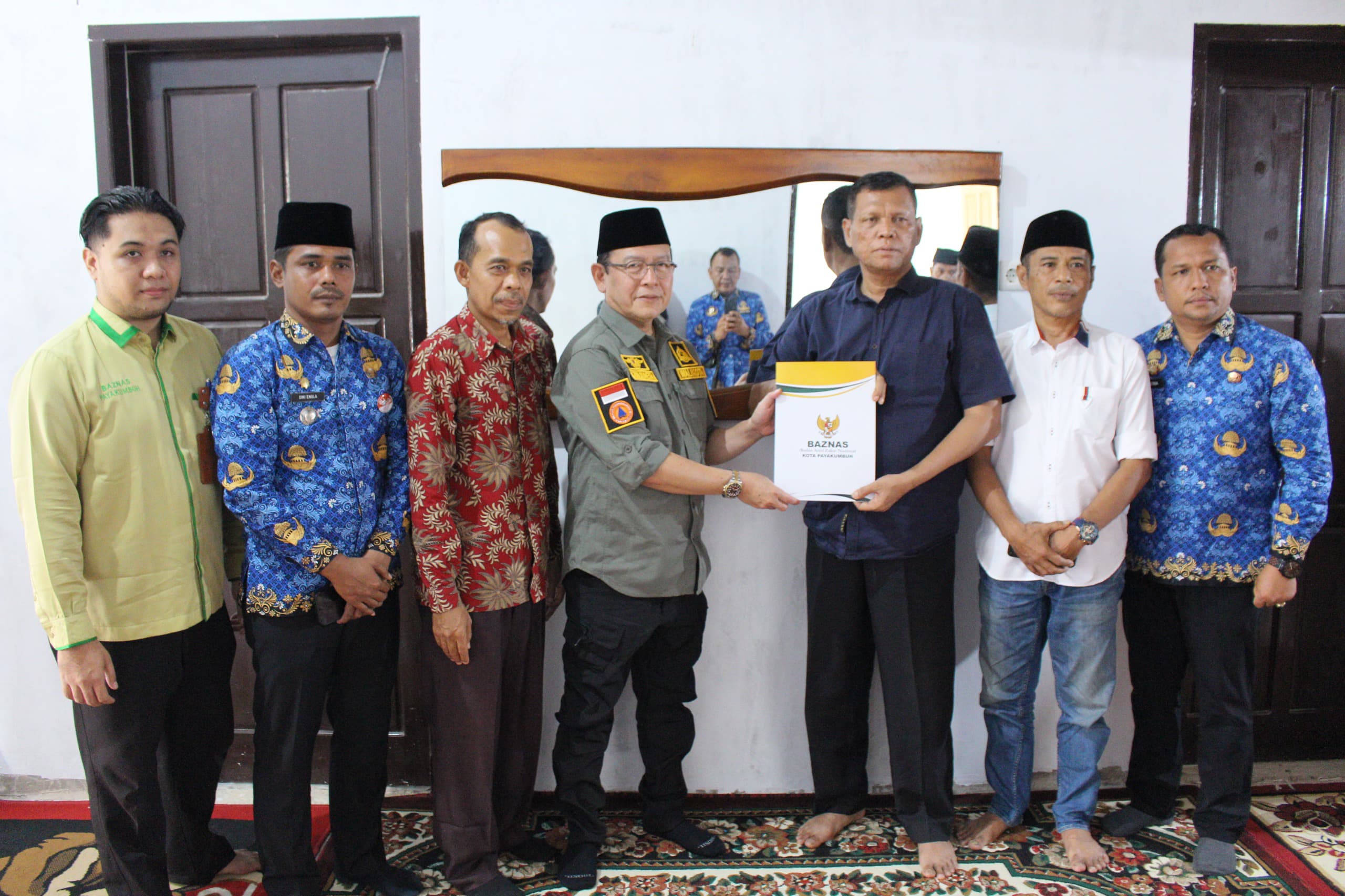 Pemko Payakumbuh Bersama Baznaz Salurkan Santunan Sosial